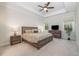 Spacious main bedroom with a king-size bed and plenty of natural light at 146 Caroline Ct., Murrells Inlet, SC 29576