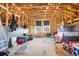 Unfinished attic space with wood framing and storage items at 146 Caroline Ct., Murrells Inlet, SC 29576