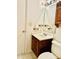 Bathroom with sink, vanity, toilet and cabinet featuring neutral colored walls at 15 Century St. # 15, Myrtle Beach, SC 29577