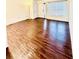 Spacious living room with attractive flooring, a large window, and a neutral color scheme, perfect for relaxing at 15 Century St. # 15, Myrtle Beach, SC 29577