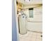 Laundry room area with a modern water heater and decorative wall art at 15 Century St. # 15, Myrtle Beach, SC 29577