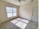 Well-lit bedroom with ceiling fan and window blinds at 155 E Chenoa Dr. # E, Murrells Inlet, SC 29576