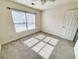 Bright bedroom featuring a large window at 155 E Chenoa Dr. # E, Murrells Inlet, SC 29576