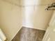 Walk-in closet with wire shelving and hanging rod at 155 E Chenoa Dr. # E, Murrells Inlet, SC 29576