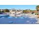 Inviting community pool with a pool house and ample deck space at 155 E Chenoa Dr. # E, Murrells Inlet, SC 29576