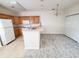 Small dining area with chandelier and neutral carpeting at 155 E Chenoa Dr. # E, Murrells Inlet, SC 29576