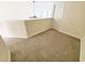 Upstairs hallway with neutral carpeting at 155 E Chenoa Dr. # E, Murrells Inlet, SC 29576