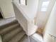 Carpeted staircase leading to the main living area at 155 E Chenoa Dr. # E, Murrells Inlet, SC 29576