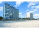 Oceanfront view of the building and beach at 2001 S Ocean Blvd. # 811, Myrtle Beach, SC 29577