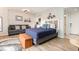 Comfortable bedroom with a queen bed and small sofa at 2001 S Ocean Blvd. # 811, Myrtle Beach, SC 29577