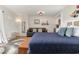 Cozy bedroom with a queen bed and small sofa at 2001 S Ocean Blvd. # 811, Myrtle Beach, SC 29577