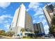 Bluewater Resort: Oceanfront building with palm trees and parking at 2001 S Ocean Blvd. # 811, Myrtle Beach, SC 29577
