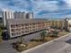 Aerial view of building, highlighting unit location and pool at 202 75Th Ave. N # 5604/5605, Myrtle Beach, SC 29572