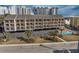 Aerial view of building, highlighting unit location and pool at 202 75Th Ave. N # 5604/5605, Myrtle Beach, SC 29572