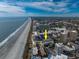 Aerial view of the building and its beachfront location at 202 75Th Ave. N # 5604/5605, Myrtle Beach, SC 29572