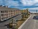Aerial view of building, highlighting unit location and pool at 202 75Th Ave. N # 5604/5605, Myrtle Beach, SC 29572