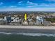 Aerial view of beachfront property, highlighting its location and proximity to the ocean at 202 75Th Ave. N # 5604/5605, Myrtle Beach, SC 29572