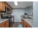 Modern kitchen with stainless steel appliances at 202 75Th Ave. N # 5604/5605, Myrtle Beach, SC 29572