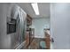 Modern kitchen with stainless steel appliances and wood cabinets at 202 75Th Ave. N # 5604/5605, Myrtle Beach, SC 29572