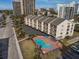 An aerial view of the property showing the pool and parking area at 202 75Th Ave. N # 5604/5605, Myrtle Beach, SC 29572