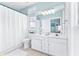 Clean bathroom with double vanity and a shower/tub combo at 204 24Th Ave. N, North Myrtle Beach, SC 29582