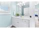 Clean bathroom with white vanity, single sink, and a large mirror at 204 24Th Ave. N, North Myrtle Beach, SC 29582