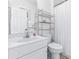 Simple bathroom with white vanity, single sink, and shower at 204 24Th Ave. N, North Myrtle Beach, SC 29582