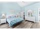 Spacious bedroom with king-size bed, dresser, and light decor at 204 24Th Ave. N, North Myrtle Beach, SC 29582