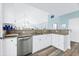 Well-equipped kitchen with white cabinets and granite countertops at 204 24Th Ave. N, North Myrtle Beach, SC 29582