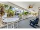 Relaxing porch with rocking chairs and outdoor table at 204 24Th Ave. N, North Myrtle Beach, SC 29582