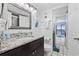 Bathroom with granite vanity and ocean view at 210 75Th Ave. N # 4141, Myrtle Beach, SC 29572
