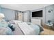 Bedroom with two beds, dresser, and flat-screen TV at 210 75Th Ave. N # 4141, Myrtle Beach, SC 29572