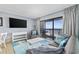 Living room with ocean view, seating area, and flat-screen TV at 210 75Th Ave. N # 4141, Myrtle Beach, SC 29572