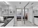 Bathroom with double vanity, granite countertop, and access to bedroom at 215 Baslow Ct. # 1-B, Myrtle Beach, SC 29572