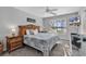 King-size bedroom with water views and ceiling fan at 215 Baslow Ct. # 1-B, Myrtle Beach, SC 29572