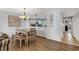 Dining area with light-colored table and bench at 215 Baslow Ct. # 1-B, Myrtle Beach, SC 29572