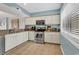 Modern kitchen with stainless steel appliances and granite countertops at 215 Baslow Ct. # 1-B, Myrtle Beach, SC 29572