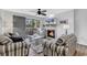 Living room with fireplace, striped sofas, and TV at 215 Baslow Ct. # 1-B, Myrtle Beach, SC 29572