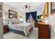 Bedroom with a queen bed and access to a shared bath at 2180 Waterview Dr. # 812, North Myrtle Beach, SC 29582