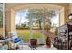 Relaxing screened porch with outdoor furniture and view of backyard at 2180 Waterview Dr. # 812, North Myrtle Beach, SC 29582