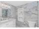 Elegant bathroom with marble-look tile and a double vanity at 2511 S Ocean Blvd. # 1601, Myrtle Beach, SC 29577