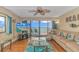 Ocean view living room, hardwood floors, and comfortable seating at 2511 S Ocean Blvd. # 1601, Myrtle Beach, SC 29577