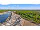 Aerial view of community with lake and trees at 3518 Bells Lake Circle # 215, Longs, SC 29568