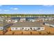 Aerial view of townhouses and lake at 3518 Bells Lake Circle # 215, Longs, SC 29568