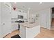 Modern kitchen with granite island and stainless steel appliances at 3518 Bells Lake Circle # 215, Longs, SC 29568
