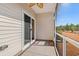 Peaceful screened porch overlooking a grassy backyard at 3518 Bells Lake Circle # 215, Longs, SC 29568