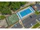 Aerial view of tennis and basketball courts with parking lot at 4396 Baldwin Ave. # 34, Little River, SC 29566