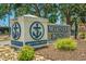 Community sign for Mariners Pointe with landscaping and stone features at 4396 Baldwin Ave. # 34, Little River, SC 29566