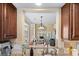 Kitchen pass through showing the dining and living rooms at 4396 Baldwin Ave. # 34, Little River, SC 29566