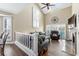 Comfortable living area with high vaulted ceilings, plantation shutters, and an abundance of natural light at 4396 Baldwin Ave. # 34, Little River, SC 29566